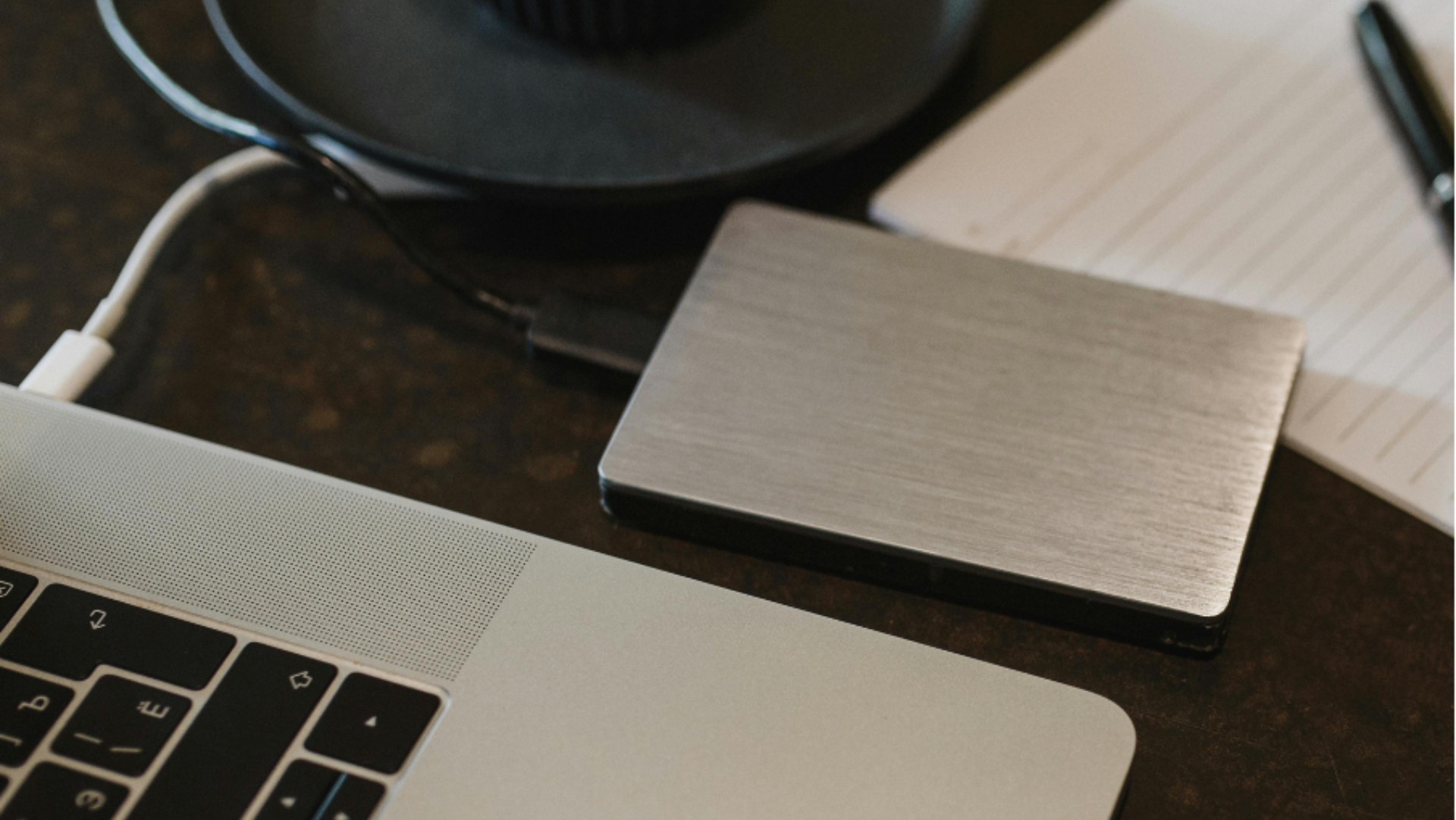 laptop on table with backup