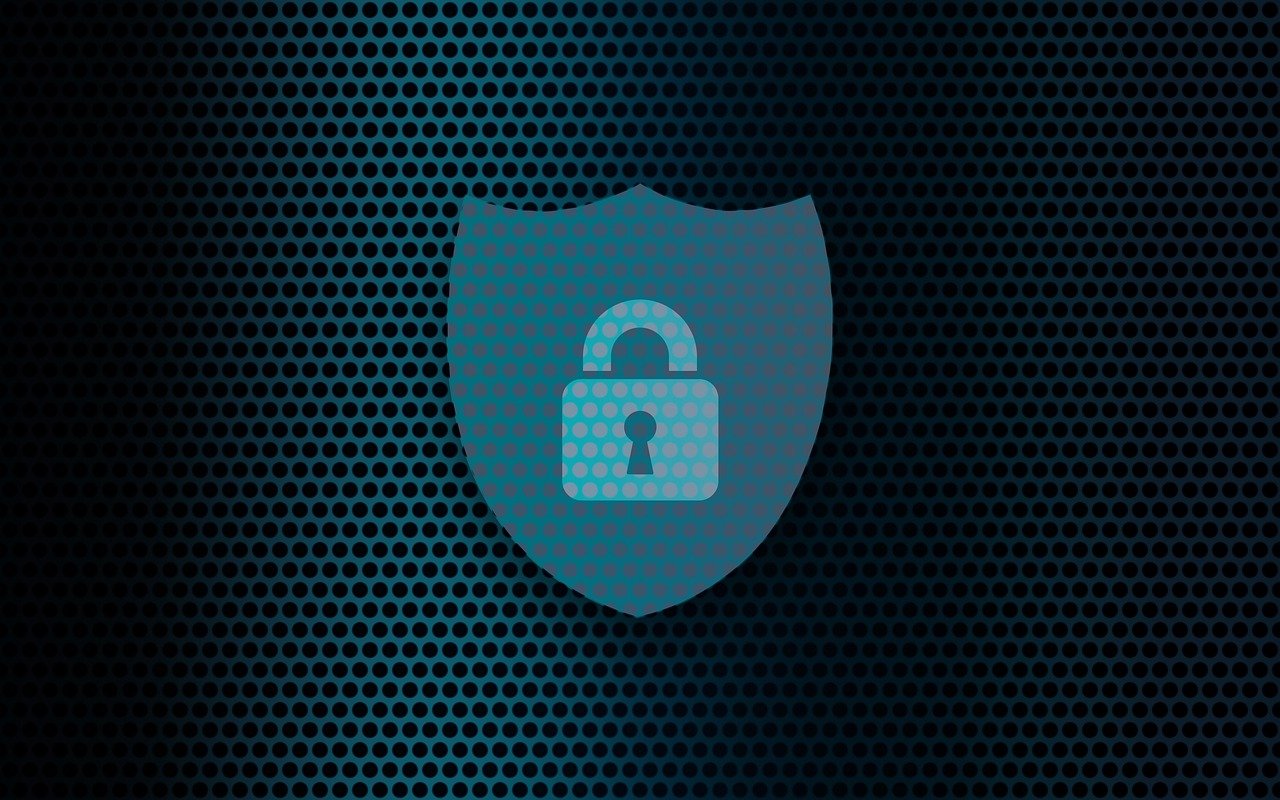 A teal shield with a lock inside